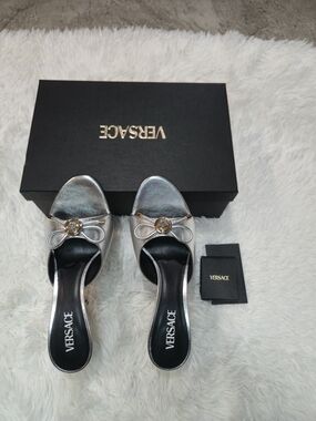 Versace Metallic Silver Slide Mules with Gold Medusa Bow